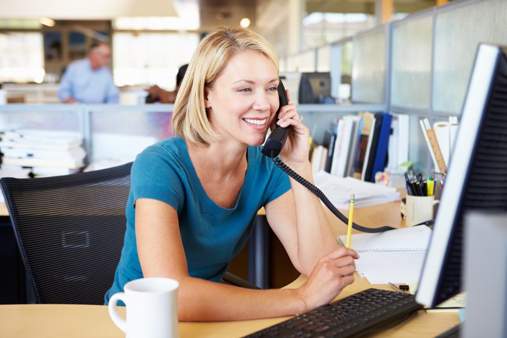 Woman on Phone in Office